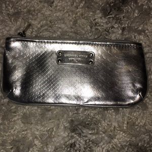 Michael Kors Silver Pouch.